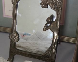 Art Nouveau style brass mirror