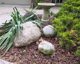 There are about 6 larger Garden rocks and couple Bird baths