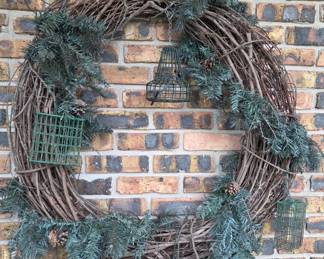 Large outdoor wreath with Suet cages for feeding birds