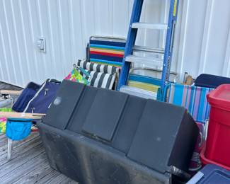 Ladder. Many beach chairs. Storage box.
