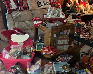 Toys. Christmas. Sleeper sofa, coffee table and end table buried somehere in there!