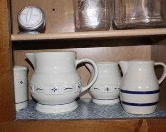 Various pieces of Longaberger pottery serving pieces