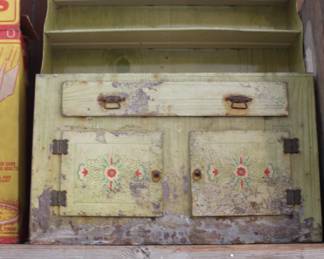 Interesting beat up child's cabinet