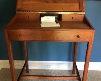 Thomas Moser standing desk with paperwork/plans 