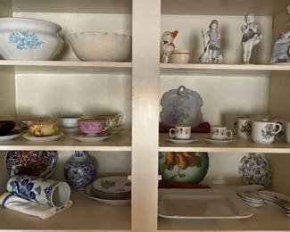 Antique porcelain figurines, plates, vases, tea cups