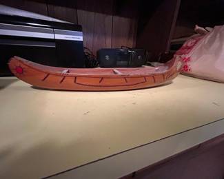 Hand-Carved Wooden Canoe with Painted Decoration and 'Camp' Inscription
