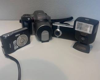 e Mixed Digital Camera  Flash Lot  Olympus IS20, Nikon Coolpix, Flip Video  Sunpak Flash