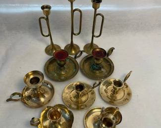 d Brass Candleholders Set Featuring Trumpet and Chamberstick Designs