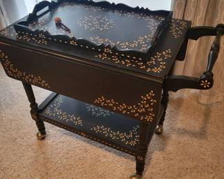 f Black Wooden Tea Cart with Golden Ivory Floral Design and Rolling Casters
