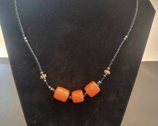 zz Handcrafted Black Beaded Necklace with Three Large Burnt Orange Barrel Beads