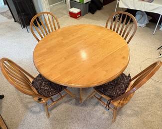 f Round Wooden Dining Table with Four Chairs  Extendable Design