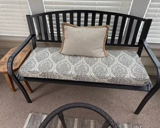 Black Metal Garden Bench with Paisley Cushions
