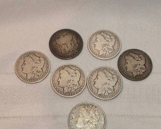 Lot Of 7 Morgan Silver Dollars