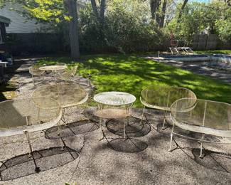 1950s Maurizio Tempestini for Salterini clamshell patio set: table with 4 chairs, 4 benches, and 2 occasional tables. They all need some restoration, but these are amazing and rare pieces. AVAILABLE FOR IMMEDIATE PURCHASE.