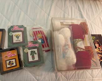 lots of vintage crafts from the 60s and 70s--needlepoint canvases, crewel kits, Persian wool for needlepoint, latch hook rug kits, painting kits, knitting supplies and more