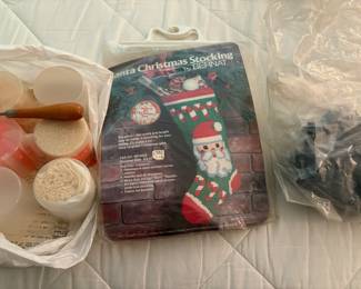 lots of vintage crafts from the 60s and 70s--needlepoint canvases, crewel kits, Persian wool for needlepoint, latch hook rug kits, painting kits, knitting supplies and more