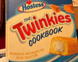 lots of vintage cookbooks including this horror "The Twinkies Cookbook", imagine making your wedding cake out of Twinkies