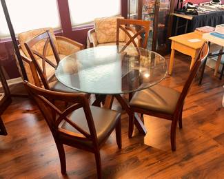Glass top table and 4 chairs 
