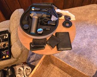 Massage gun, small table and wicker basket