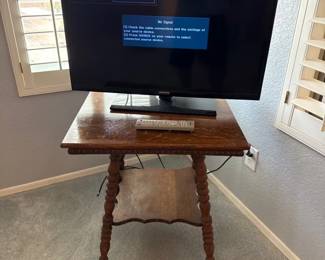 A Samsung 32 Inch Television And A Table To Sit It On