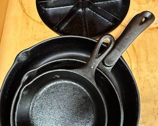 Assorted Cast Iron Skillets by Lodge and Cracker Barrell