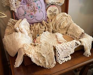 Doilies and vintage suitcase