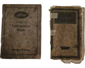 3800 - 2 Early Ford Model A Instruction Manuals (Description): Two early Ford Model A instruction manuals  published by Ford Motor Company. The lot  includes a Ford Model "A" Instruction Book  with the Ford logo on the cover, along with a  smaller Ford Manual. Both manuals show significant age and wear consistent with  their vintage, with worn covers and aged  pages. These original owner's manuals provide  period documentation for early Ford Model A  automobiles.