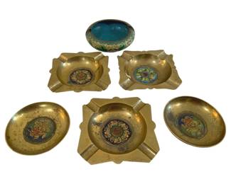384 - 6 Oriental Brass Ashtrays (Description): A collection of six Oriental brass ashtrays  featuring decorative enamel work. The set  includes various shapes including square and  oval forms, each adorned with colorful floral  medallion designs in the cloisonne style.