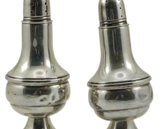 100 - Pr Schweitzer Silver Corp. Sterling Shakers (Description): A pair of sterling silver shakers by  Schweitzer Silver Corp. Each shaker measures  5.5 inches in height. 4.51oz total weight.