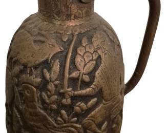 3899 - Vintage Middle Eastern Repousse Jug (Description): repousse work features figures & animals