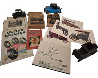 3802 - Automotive Ephemera w/ Toy Cars Collection (Description): A collection of vintage automotive-related  items including car books, ephemera, and toy  cars. The lot features various publications  including a U.S. Tire Retailer magazine,  Chilton Catalog and Directory, Bendix 4 Wheel Brakes booklet, Automotive South  publication, and other automotive literature.  Also included are decorative antique car  prints, a Cities Service Dealer promotional  piece, and three vintage toy cars in black