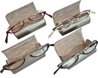 1976 - 4 Judith Leiber Folding Reading Glasses (Description): Collection of four Judith Leiber folding  reading glasses, each housed in its original  coordinating case. The glasses feature  various frame colors including red, gold, and  dark tortoise tones. Each case is finished in a metallic silver snakeskin-textured  material with suede-like interior stamped  with the Judith Leiber name.