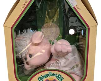 4163 - Coleco Cabbage Patch Kids Koosas Pet in Box (Description): Cabbage Patch Kids Koosas pet by Coleco. This  Wykoosa Valley Koosas plush toy comes in its  original packaging, designed as a companion  pet for Cabbage Patch Kids dolls.