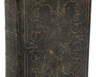 780 - 1845 Ed. Book of Common Prayer (Description): An 1845 edition of the Book of Common Prayer.  The volume features an embossed leather  binding with decorative gilt tooling on the  cover and spine. The book shows  age-appropriate wear consistent with its mid-19th century origin.