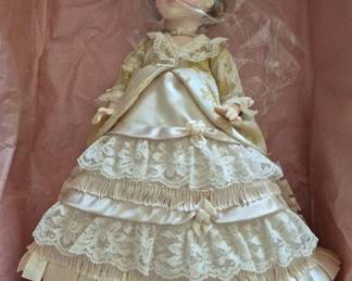 1385 - Madame Alexander Lucy Webb Hayes Doll 13" (Description): Madame Alexander doll depicting Lucy Webb  Hayes, the First Lady of the United States  from 1877 to 1881. The doll features an  elaborate Victorian-style gown with satin,  lace, and fringe details. Measures 13 inches in height.