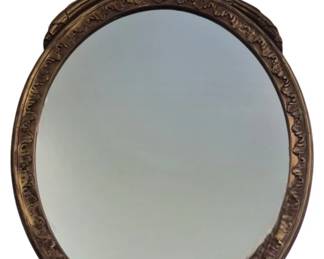 3724 - Oval Wood Mirror w/ Urn Finial 28"x20" (Description): Vintage oval wall mirror featuring a carved  wood frame with a gilt finish. The frame  displays classical styling with decorative  molding and is topped by an elegant urn  finial crest with draped swag details. The neoclassical design suggests late 19th to  early 20th century craftsmanship.
