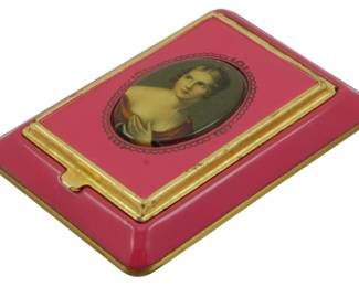 1765 - Vintage Art Deco Compact 3"x2" (Description): Vintage Art Deco compact featuring a portrait  medallion on the lid with gold-tone trim  accents. Measures 3 inches by 2 inches.