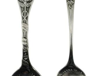 108 - 2 Ornate Sterling Spoons 0.49oz (Description): Two ornate sterling silver spoons featuring  detailed decorative designs. Total weight is  0.49 ounces.