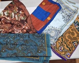 2860 - 5 Ellen Tracy Scarves (Description): Collection of five Ellen Tracy scarves  featuring a variety of patterns and colors.  Includes a brown scarf with a nature motif, a  rust and blue geometric design, a light blue  paisley print, an olive and gold floral pattern with purple accents, and a teal  paisley design. All scarves appear to be silk  or silk-blend with finished edges.