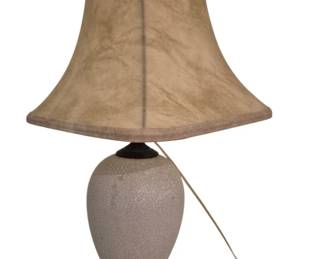 3806 - Crackle Glaze Pottery Table Lamp 21.5" (Description): Pottery table lamp featuring a cream-colored  crackle glaze finish on an urn-shaped body.  The lamp rests on a dark wooden base and is  topped with a coordinating bell-shaped shade  in a mottled tan tone. Used as is electric/electronic/mechanical  item. No guarantee all components, untested.