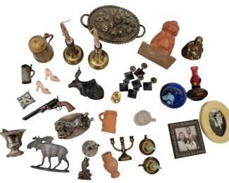444 - Group Lot of Miniatures (Description): Group lot of miniatures. The assortment  features a variety of small collectibles  including miniature furniture, decorative  objects, picture frames, thimbles, a toy  pistol, candlesticks, figurines, and various brass and metal accessories. The collection  encompasses items in brass, terracotta,  glass, and other materials, suitable for  dollhouse display or miniature collecting.