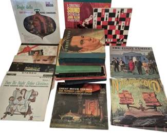 3908 - Vintage Vinyl Record Collection (Description): A group of vintage vinyl records featuring a  variety of genres and artists. The collection  includes Christmas albums such as Guy  Lombardo and His Royal Canadians 'Jingle  Bells,' 'A Christmas Sound Spectacular,' and Fred Waring and The Pennsylvanians  'Twas The  Night Before Christmas.' Also included are  Perry Como albums, 'The First Family,'  'Nashville Gold,' 'Great Movie Themes' by The  Norman Luboff Choir, and various other LP