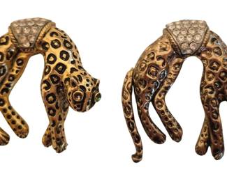 1494 - 2 Florenza Leopard Brooches (Description): This is a vintage Florenza leopard brooch, a  collectible costume jewelry piece from the  1960s or 1970s featuring gold-tone metal,  green rhinestone eyes, and a pave rhinestone  saddle. One eye has lost its stone.