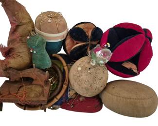 4178 - Lot of Vintage Pin Cushions (Description): A collection of vintage pin cushions in  various styles, shapes, and materials. This  assortment includes multiple decorative pin  cushions reflecting different eras and  craftsmanship traditions.
