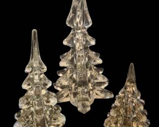 2789 - 3 Crystal Christmas Tree Figurines 11.5" (Description): Set of three clear crystal Christmas tree  figurines in graduated sizes. Each tree  features a tiered design with pointed tops  and spread bases, crafted in sparkling clear  crystal. The tallest measures 11.5 inches high.
