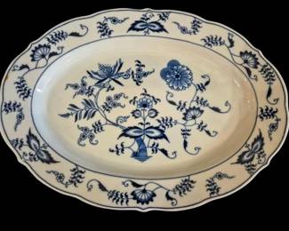524 - Blue Danube Oval Serving Platter 14"x10" (Description): Blue Danube oval serving platter featuring  the classic Blue Onion pattern. This elegant  piece displays traditional cobalt blue floral  and botanical motifs on a white ground,  including stylized chrysanthemums, bamboo shoots, and scrolling vine work. The platter  has a scalloped edge with decorative border  design. Measures 14 inches by 10 inches.