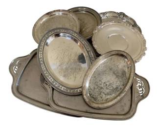1671 - Group Silver Plated Platters (Description): Assorted sizes and styles. The grouping  includes various oval and round forms with  decorative borders and edges.