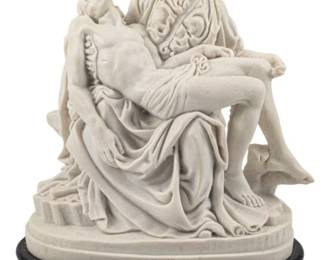 753 - A. Santini Pieta Resin Sculpture 9" (Description): A. Santini resin small sculpture depicting  the Pieta, the iconic image of the Virgin  Mary cradling the body of Christ. The white  resin figure is mounted on a dark wooden base  with 'Pieta' inscribed on the front. Measures 9 inches tall.