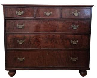 1277 - 1800s English Mahogany Chest of Drawers (Description): Featuring a two-over-three drawer  configuration. The piece has a rectangular  top with molded edge, three small drawers  above three graduated long drawers, each  fitted with brass bail handles and escutcheons. The chest rests on turned bun  feet. The rich mahogany displays attractive  figuring throughout the drawer fronts.  Measures 38" x 45" x 21".