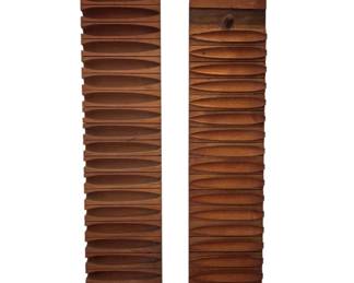 486 - 2 Cigar Molds 22"x45" (Description): Two antique wooden cigar molds featuring  multiple carved cavities used for shaping  cigars. The molds feature hanging holes at  the top and bottom for storage. Measures 22"  x 45".